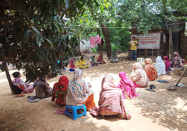 Courtyard meeting in Soshanghat, Zinjira Union under Keraniganj Upazila
